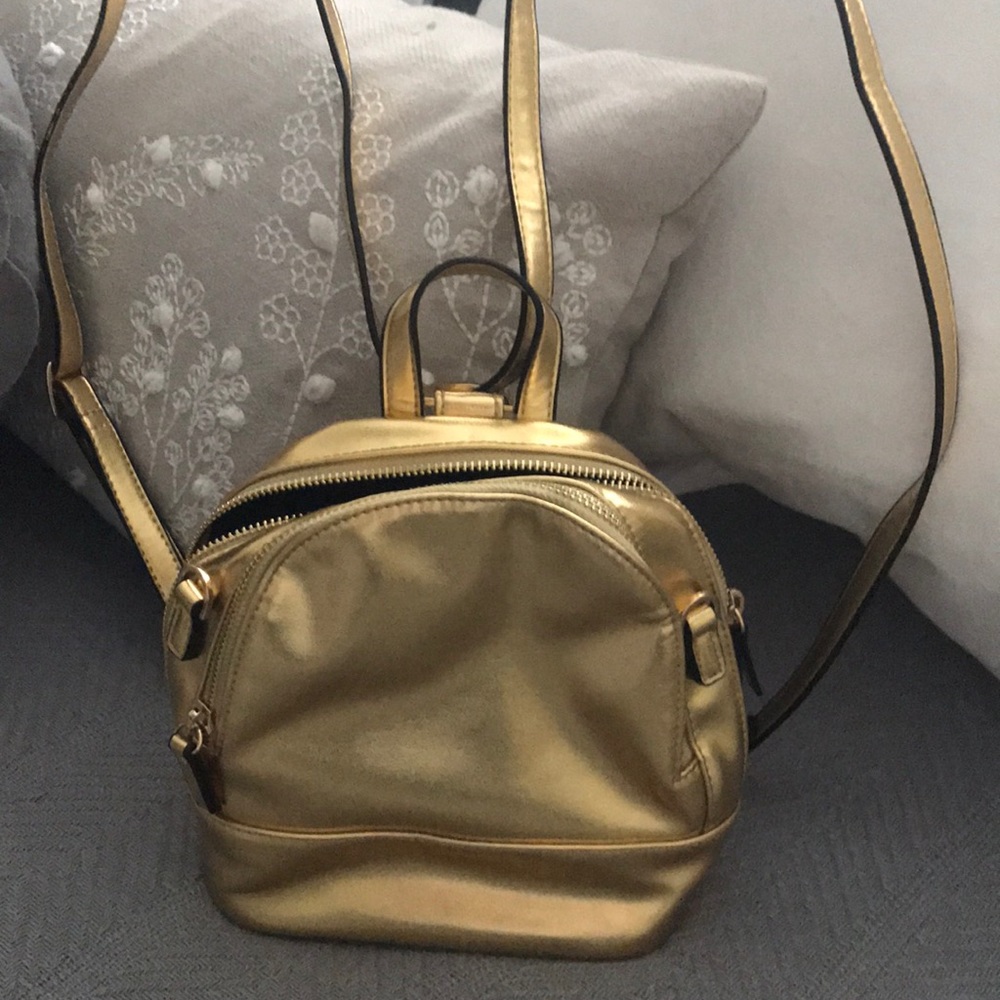 Forever 21 goldtone small backpack purse